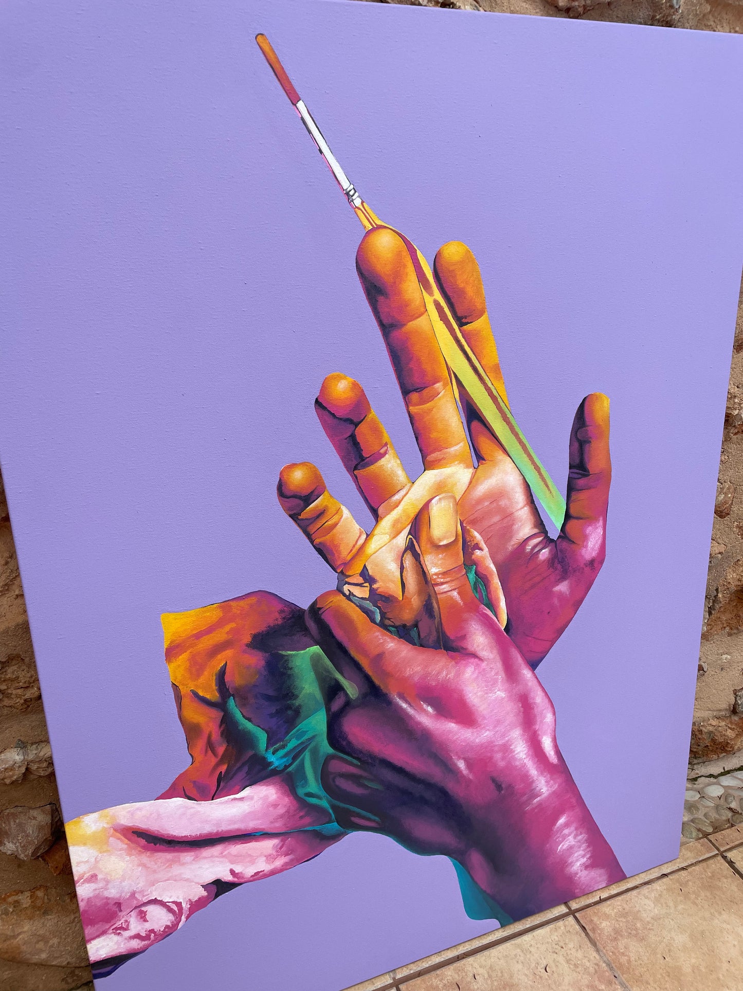 pintura de manos y pinceles en acrílico sobre lienzo en Mallorca